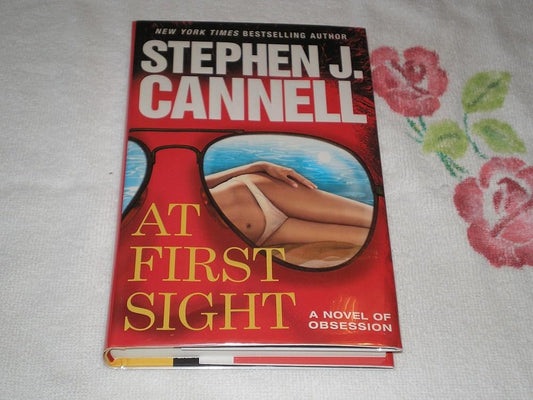 At First Sight: A Novel of Obsession cover image