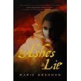 In Ashes Lie by Marie Brennan (2009) Hardcover cover image
